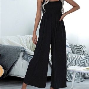 Black smocked wide-leg jumpsuit XL. Never worn.
